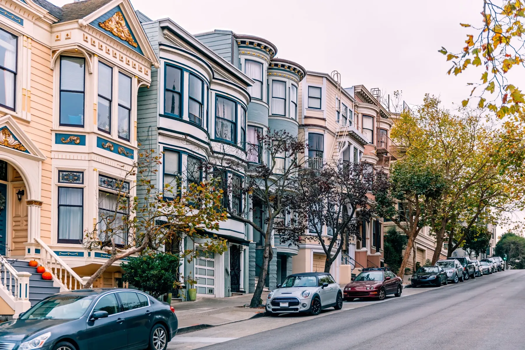 A San Francisco street lined with Victorian homes and trees